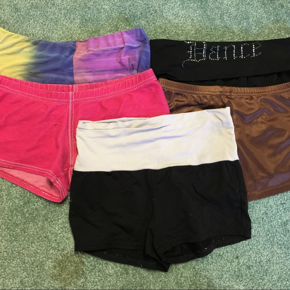 Five dance shorts in size adult small